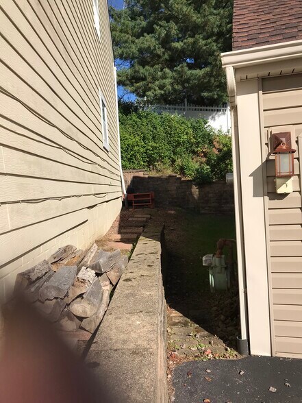 "no fence" side from driveway to backyard - 2568A Grouse Ridge