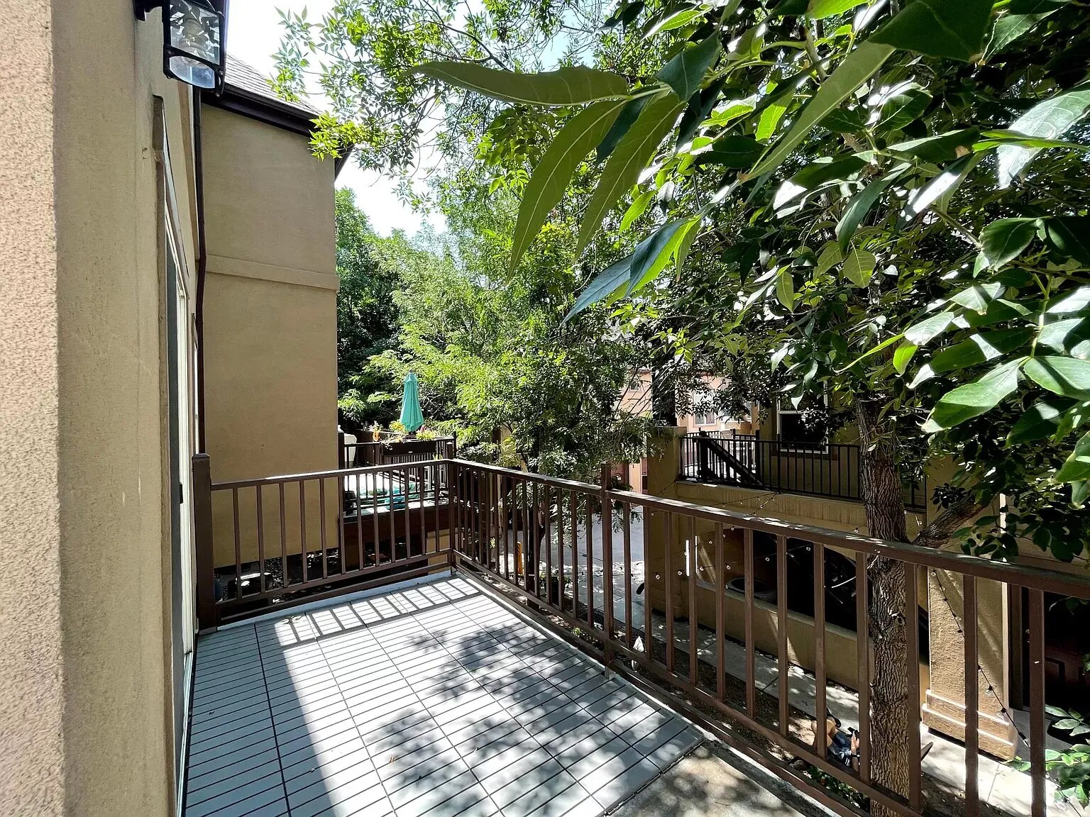 Balcony overlooking the courtyard. - 1641 N Washington St