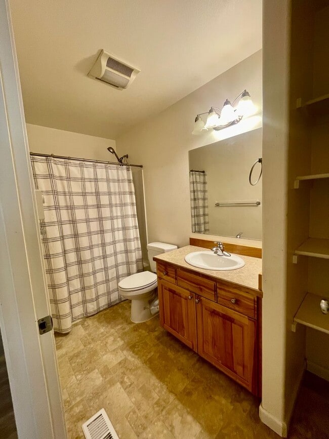 Building Photo - Ranch style 3bedroom/2 bathroom with an Oversized two car garage +giant carport!  Large private l...