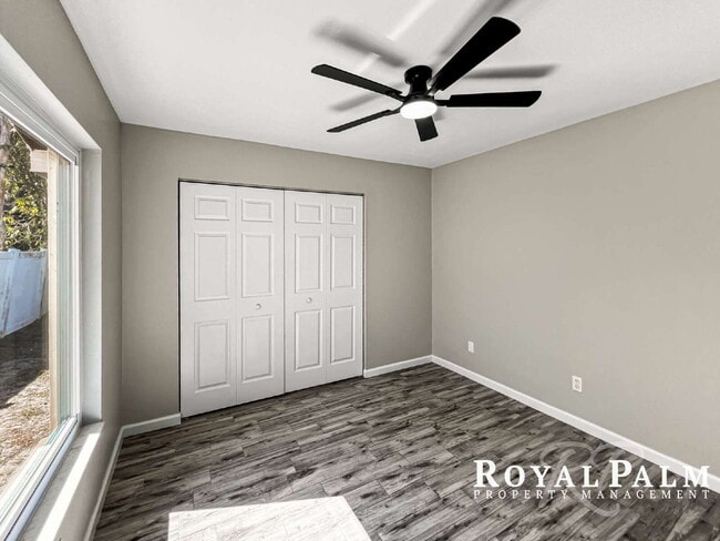 Building Photo - Tree-Lined 2BR/1BA Fort Myers Duplex with Fenced Yard, Storage Shed & In-Unit Laundry!