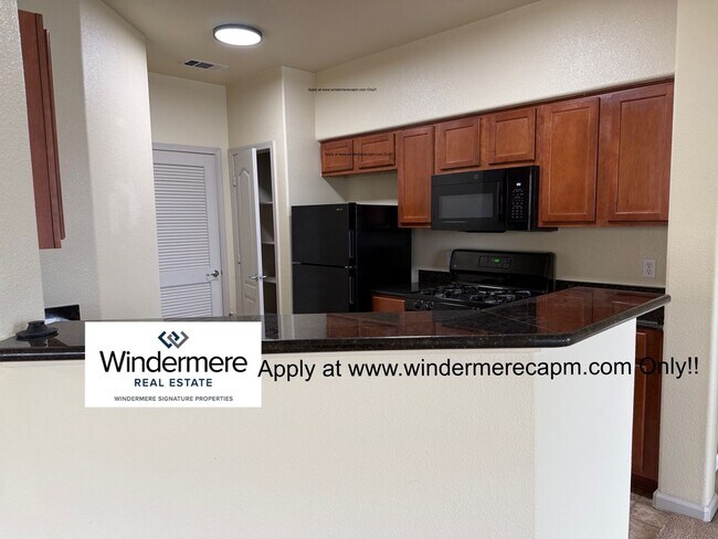 Building Photo - Absolute MUST See Condo In Immaculate Condition With Open Flowing Floor Plan!