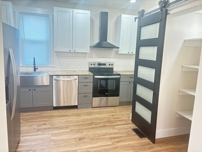 Building Photo - Newly Remodeled 4 Bedroom by Electric Works