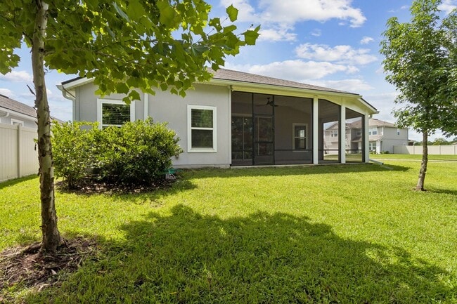 Building Photo - Modern 4BR Home with 3 Full Baths in River Glen | Screened Porch & Resort-Style Amenities