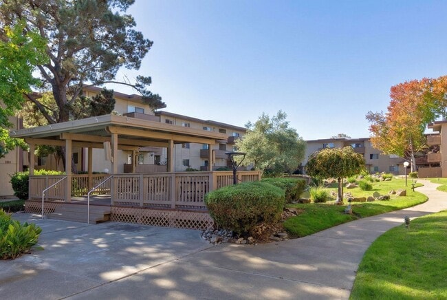 Building Photo - Modern 2-Bedroom Condo with Pool and Koi Pond Views