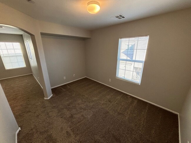 Building Photo - Spacious Tri-Level 4-Bedroom Home with Bal...