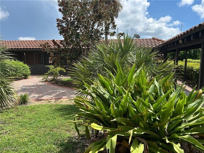 Building Photo - 25000 Tamiami Trl E