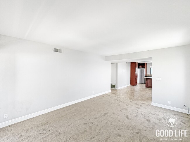 Building Photo - Light-Filled 2BD/2BA Top-Floor Condo in Mira Mesa with Granite Kitchen, Private Balcony & Pool