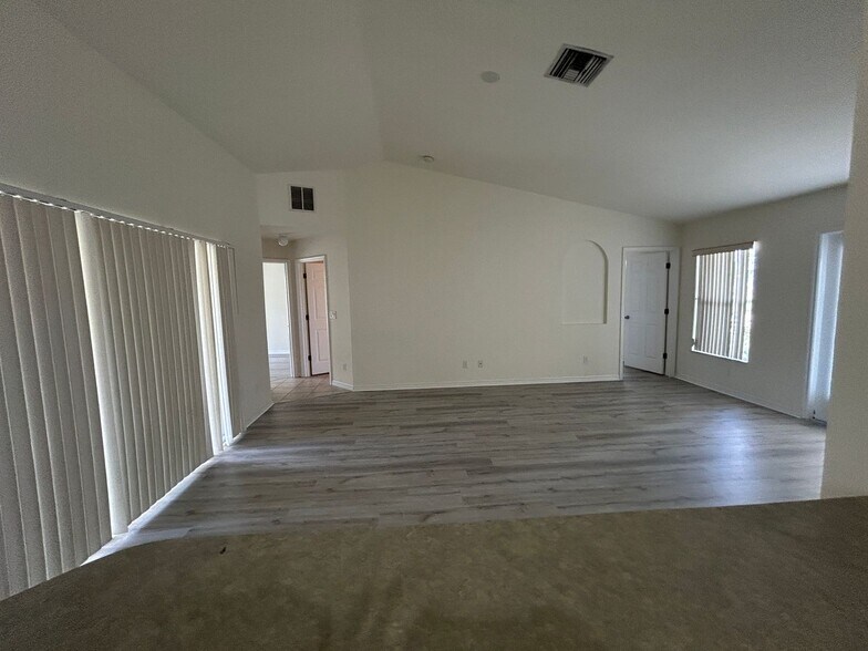 Building Photo - Nice 3/2 with newer carpet