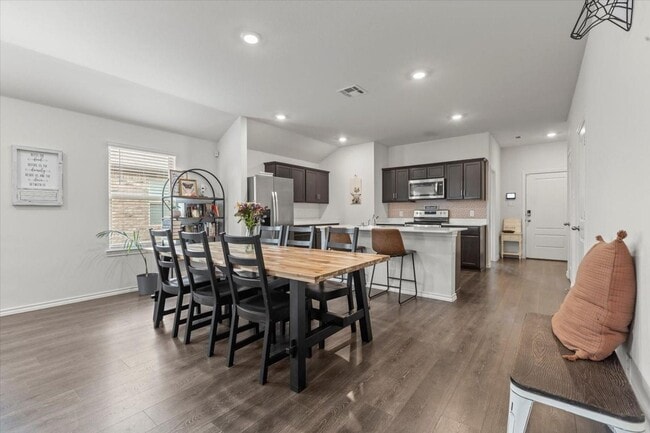 Building Photo - Modern single-story home with 4 bedrooms, 2 bathrooms, open-concept living, stylish kitchen, two-...