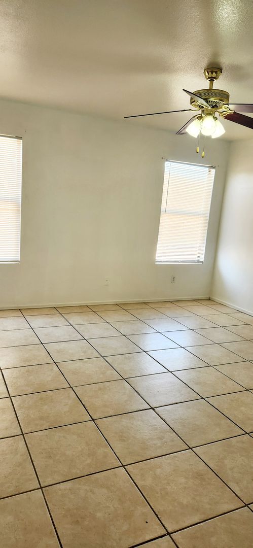 Building Photo - Large 4 Bedroom- A/C- All Ceramic Tile- Wo...