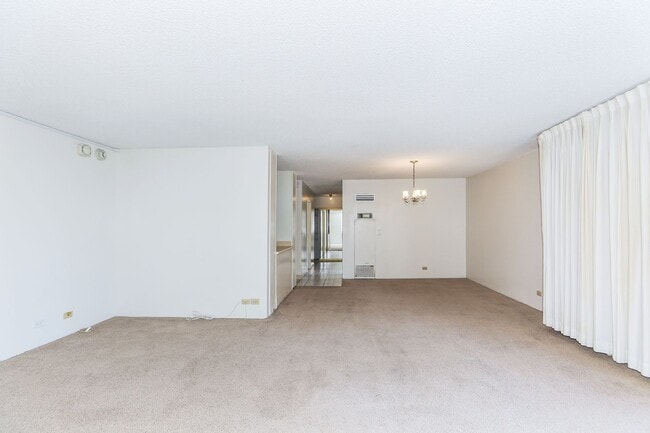 Building Photo - Aloha Towers - 2 bedroom, 2 bath corner unit with 1 covered parking stall