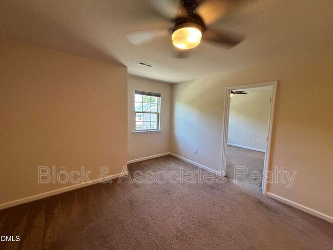 Building Photo - 1009 Magnolia Blossom Ln