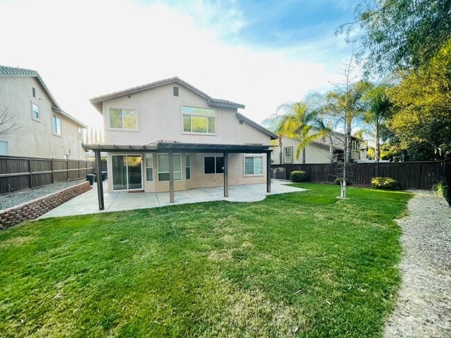 Building Photo - 42020 Dahlia Way