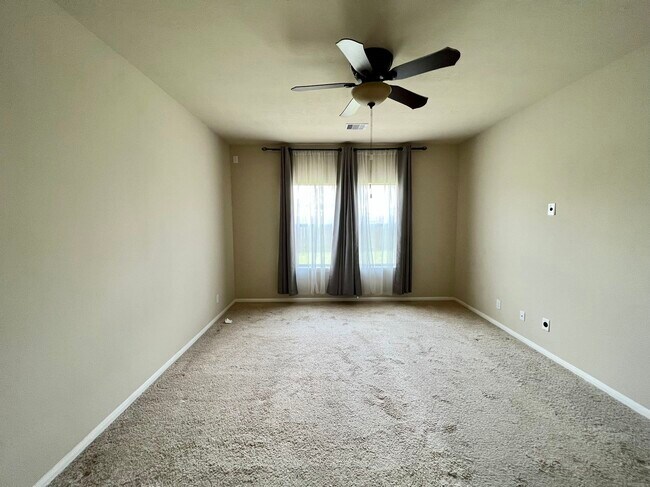 Building Photo - 10831 Woodwind Shadows Dr