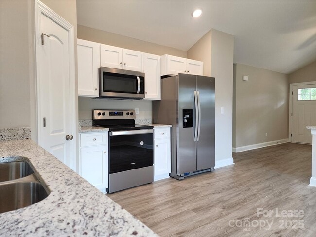 Building Photo - 30 Stricker Ave NW