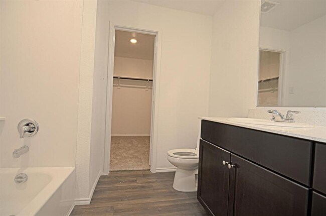 Building Photo - 5701 Manarchos Ln