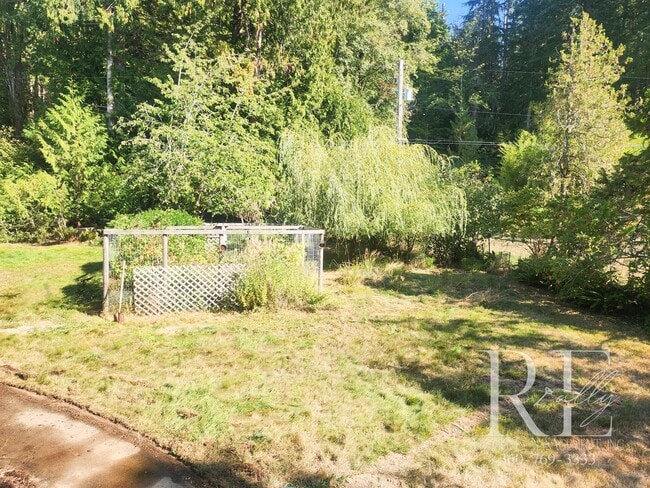 Building Photo - Waterfront Tudor | Private, Vintage Charm with Casita