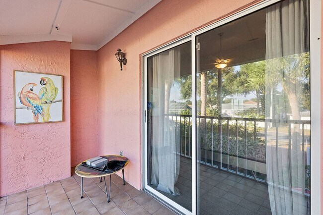 Building Photo - Two Bedroom/Two and a half bath gated townhome.