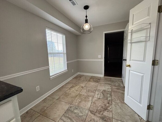 Building Photo - You will LOVE the fenced yard!