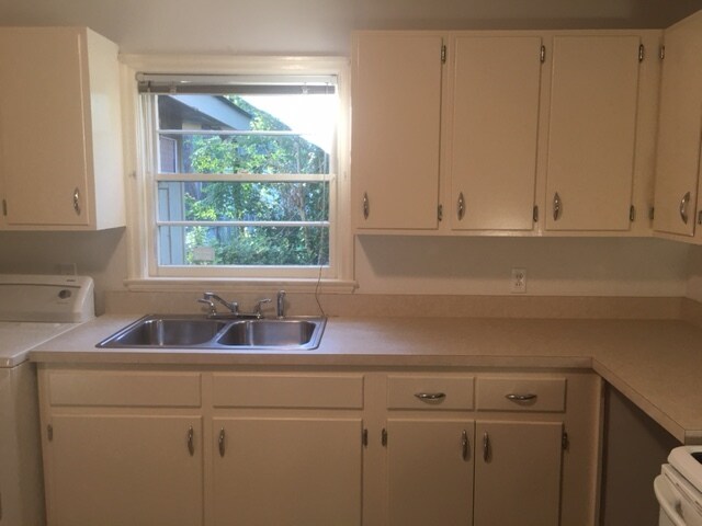 off white kitchen, including all appliances. - 1206 Lafayette Ave