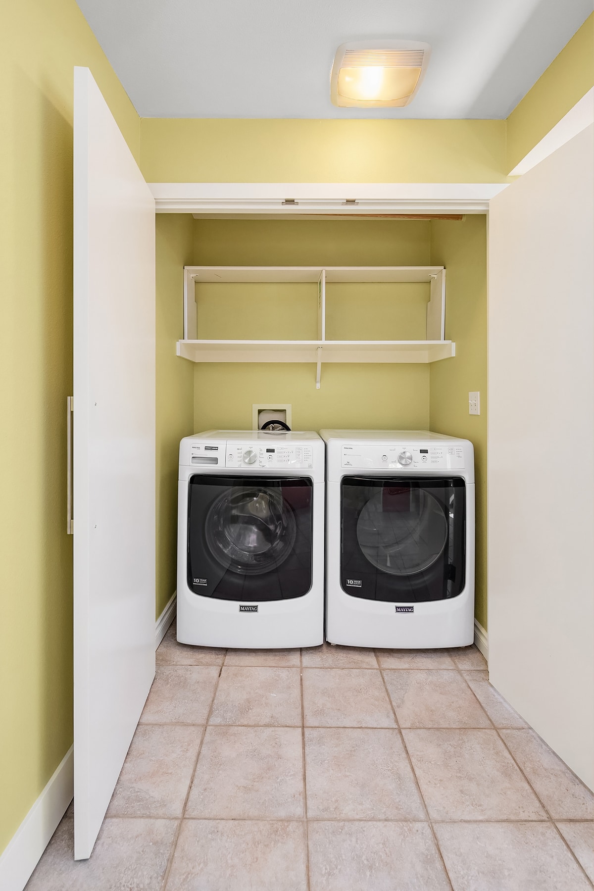 New front loading washer and dryer in unit. - 7051 8th Ave NW