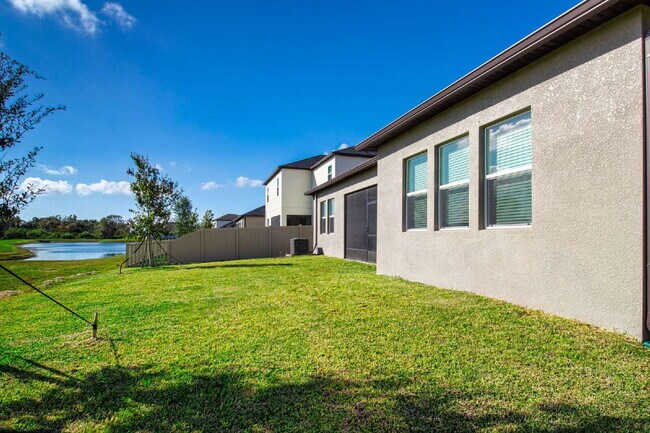 Building Photo - Spacious Like New 4-Bedroom Oasis with 3 Full Baths in Palmetto - Available NOW