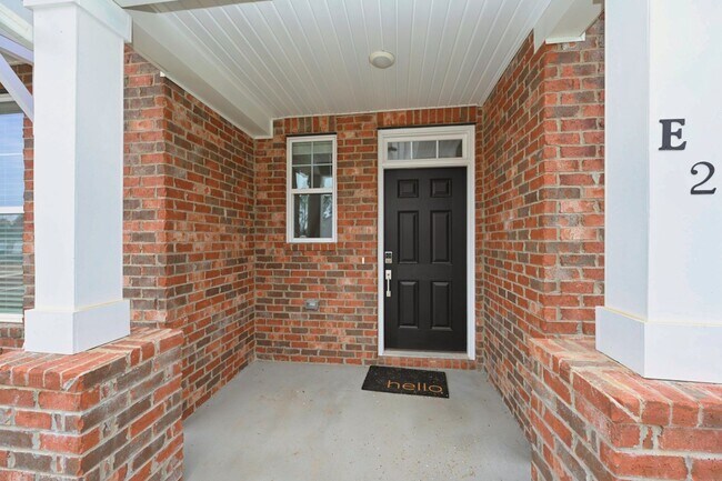 Building Photo - **BE THE LUCKY ONE TO LIVE IN THIS 2024-BUILT BRICK TOWNHOME IN THE VILLAS AT REGAL SQUARE FEATUR...