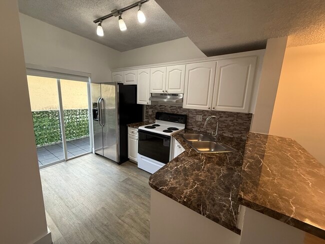 Building Photo - 7497 W 22nd Ave