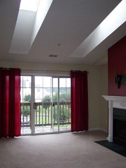 vaulted ceiling with sky lights - 151 Brookland Ter