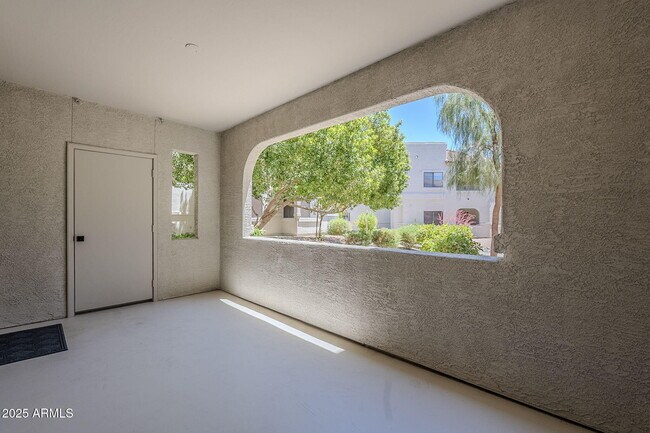 Building Photo - 9455 E Raintree Dr