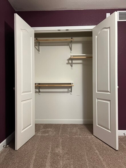 Bedroom 2 closet (upstairs) - 4701 Rainbow Trout Dr
