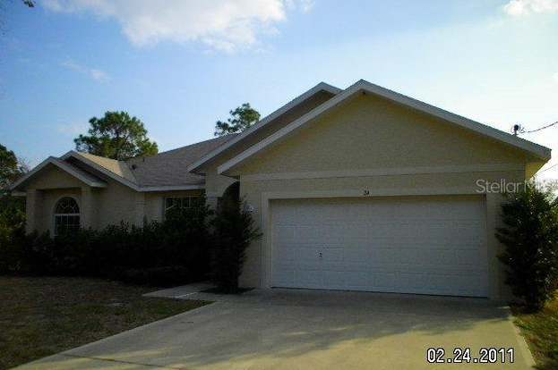 Building Photo - 24 Royal Palm Ln