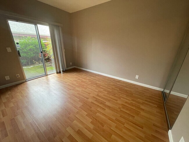 Building Photo - Remodeled 2 Bedroom 2 Bath Condo in Park-like Cedar Gables Community!