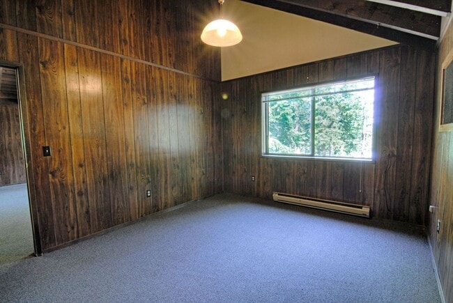 Building Photo - LONG-TERM RENTAL: Upper Floor Unit in Duplex with Washer/Dryer & Wood Stove!