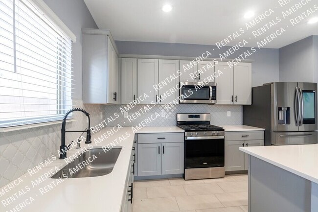Building Photo - 12440 W Gini Ln
