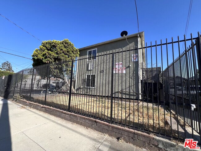 Building Photo - 1016 W 109th Pl
