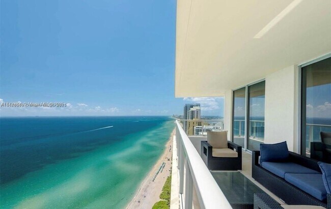 Building Photo - 16699 Collins Ave