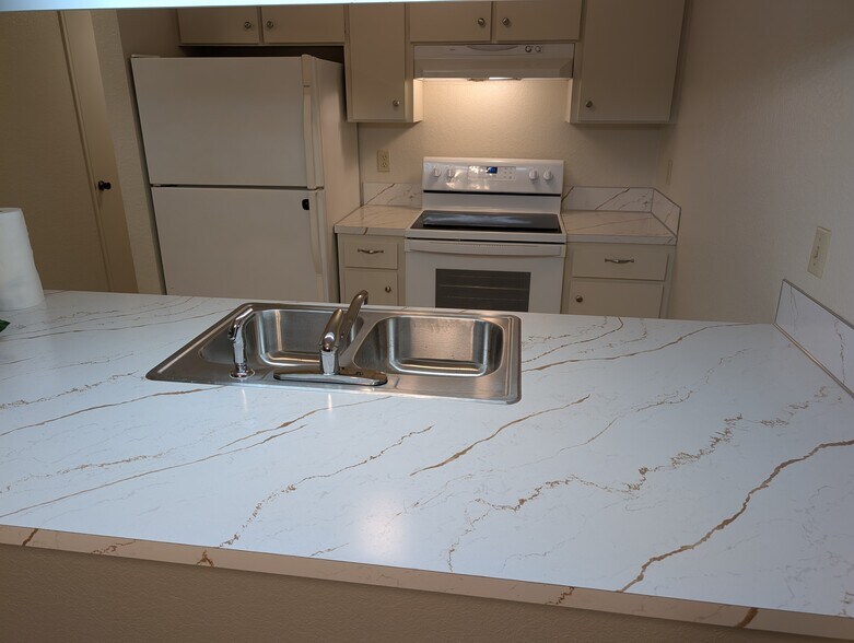 New counters, sink, faucet, and paint - 4617 80th St NE