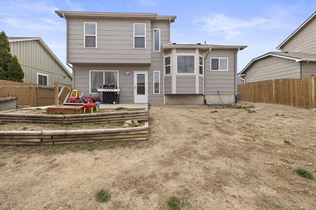 Building Photo - Spacious 4-Bedroom Home with Fenced Yard, 2-Car Garage & Scenic Views in Cheyenne Meadows