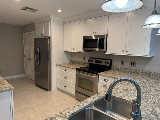 Building Photo - COMING SOON!! Highly Desirable DR PHILLIPS 3 bedroom 2 bath townhome with double car garage