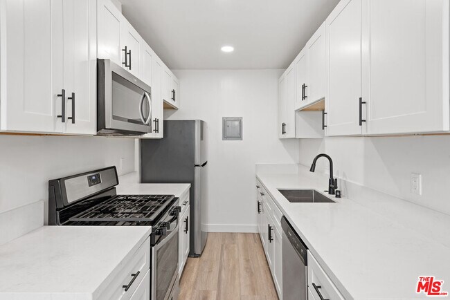 Building Photo - 3707 S Canfield Ave