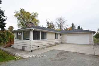 Building Photo - 609 114th Ave E