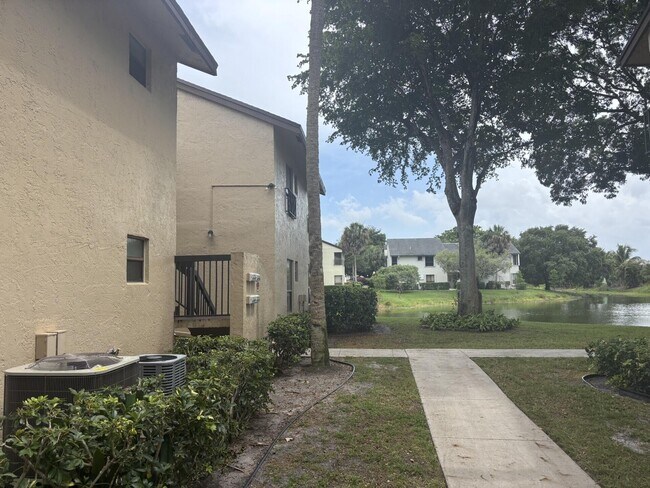 Building Photo - 3751 Cocoplum Cir