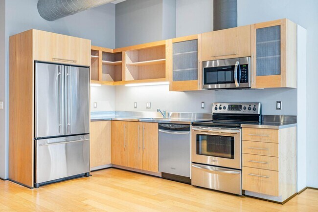 Building Photo - Stylish, south-facing 1-bdrm/1-bath loft in the Pearl—Deeded parking & storage