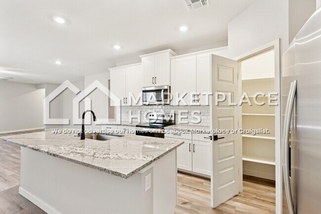 Building Photo - 10281 North 115th Avenue
