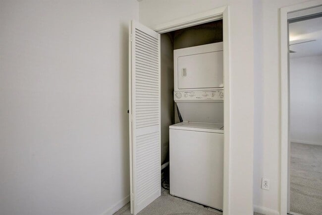 Building Photo - Beautifully remodeled two-story condo in a...
