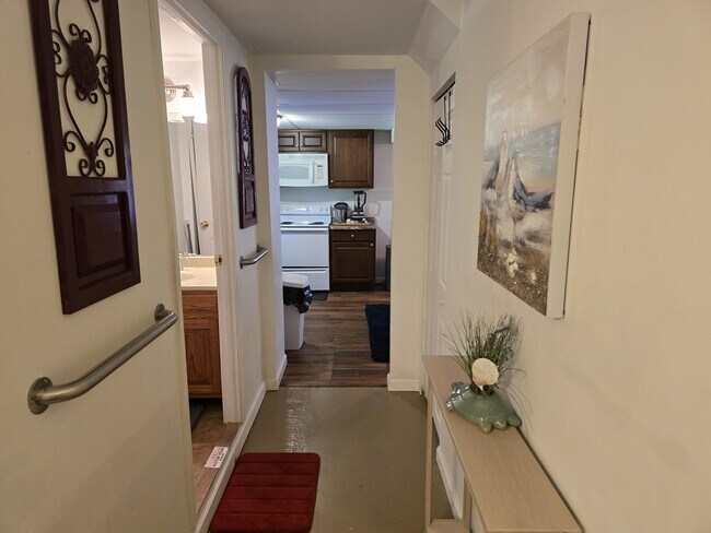 Hallway into kitchen - 4946 Saint Pauls Church Rd