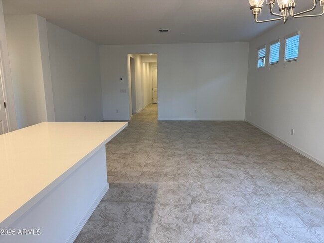 Building Photo - 9960 W Mitchell Ave