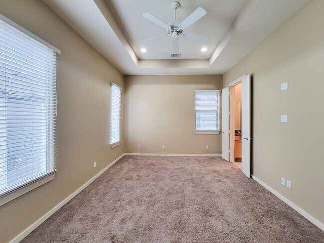 Building Photo - Elegant Gated Townhome Offering Unparallel...