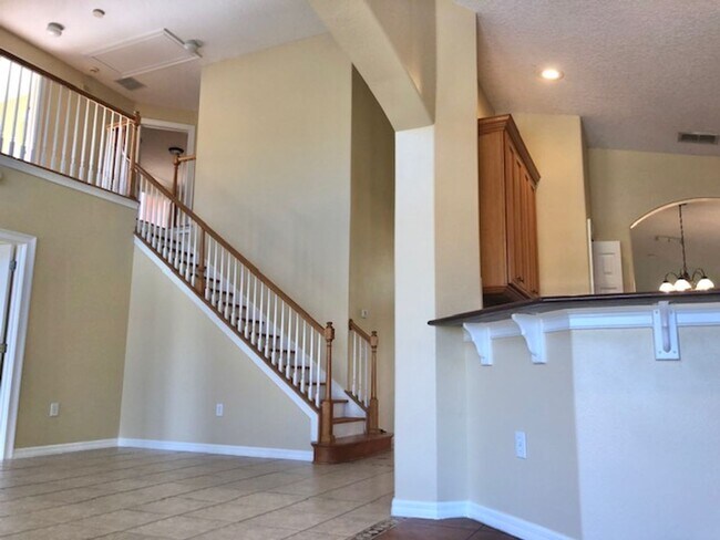 Building Photo - EAGLE CREEK LAKE NONA! WELCOME HOME! Beautiful water views! Spacious 2 story-3 bedroom 2.5 bath h...